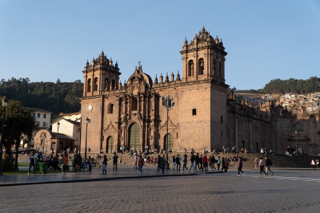 Large historic cathedral with people in square